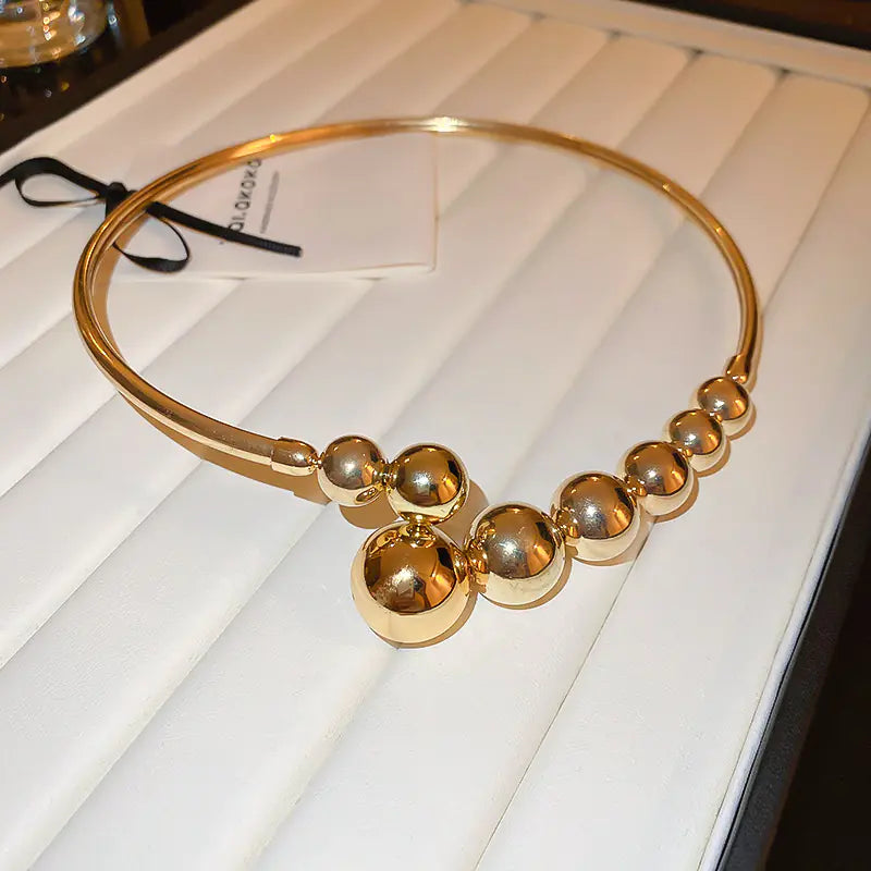 Trendy Gold Sphere Choker Necklace with Bold Design