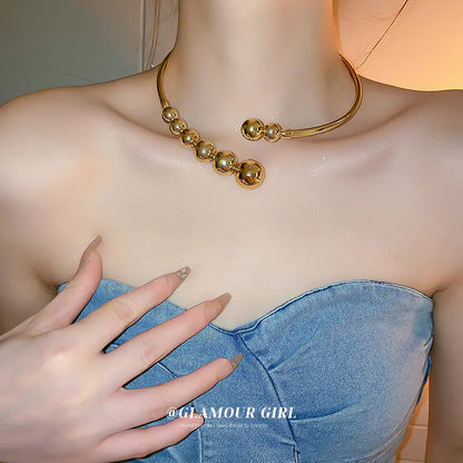 Trendy Gold Sphere Choker Necklace with Bold Design
