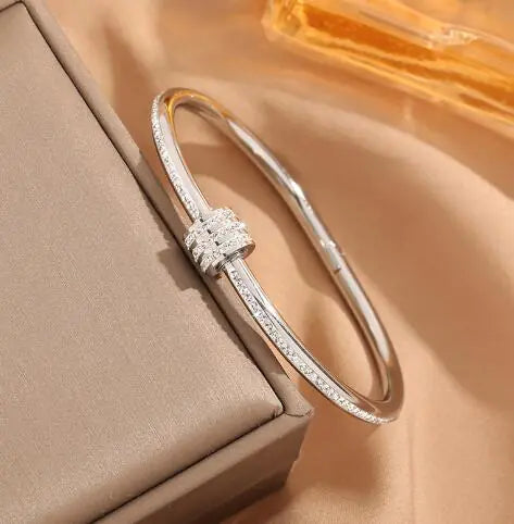 Three Rows of Clay and Diamond Bracelets