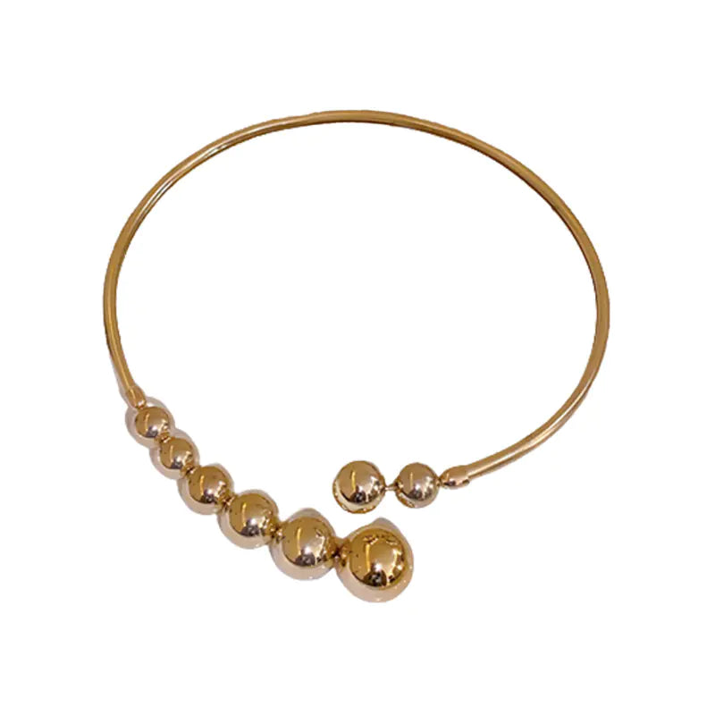 Trendy Gold Sphere Choker Necklace with Bold Design